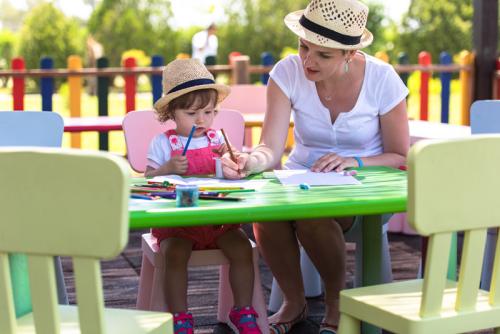 mom-and-little-daughter-drawing-a-colorful-QUR5J8Z.jpg